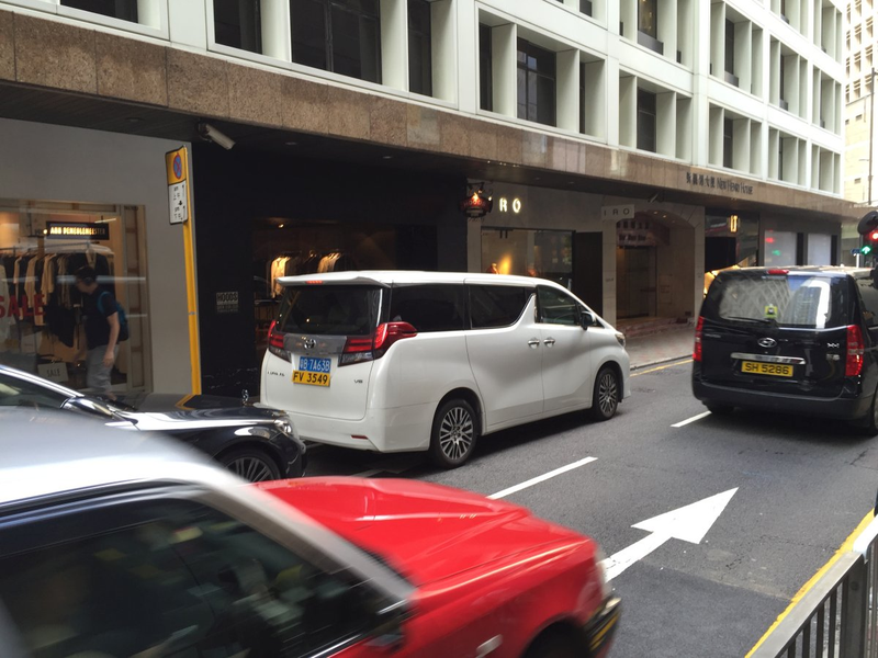 An Alphard from mainland China. Foreign cars bear a temporary Hong Kong plate marked “FV”